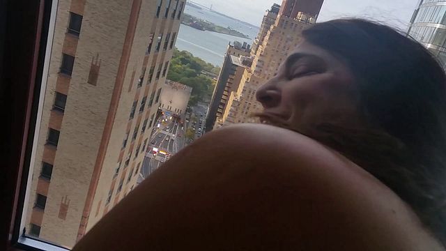 Curvy MILF gets fucked in NYC hotel window