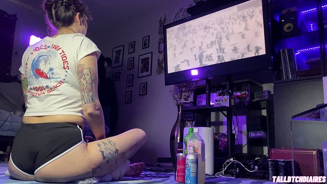 Curvy Tomboy in Dolphin Shorts Enjoys Drakengard Gameplay